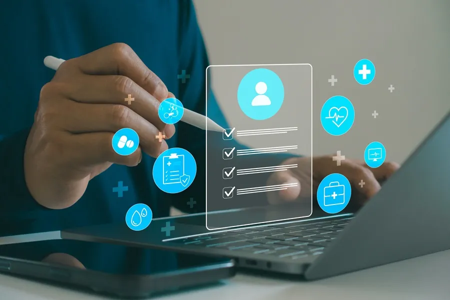 Doctor's hand with pointer on a transparent screen